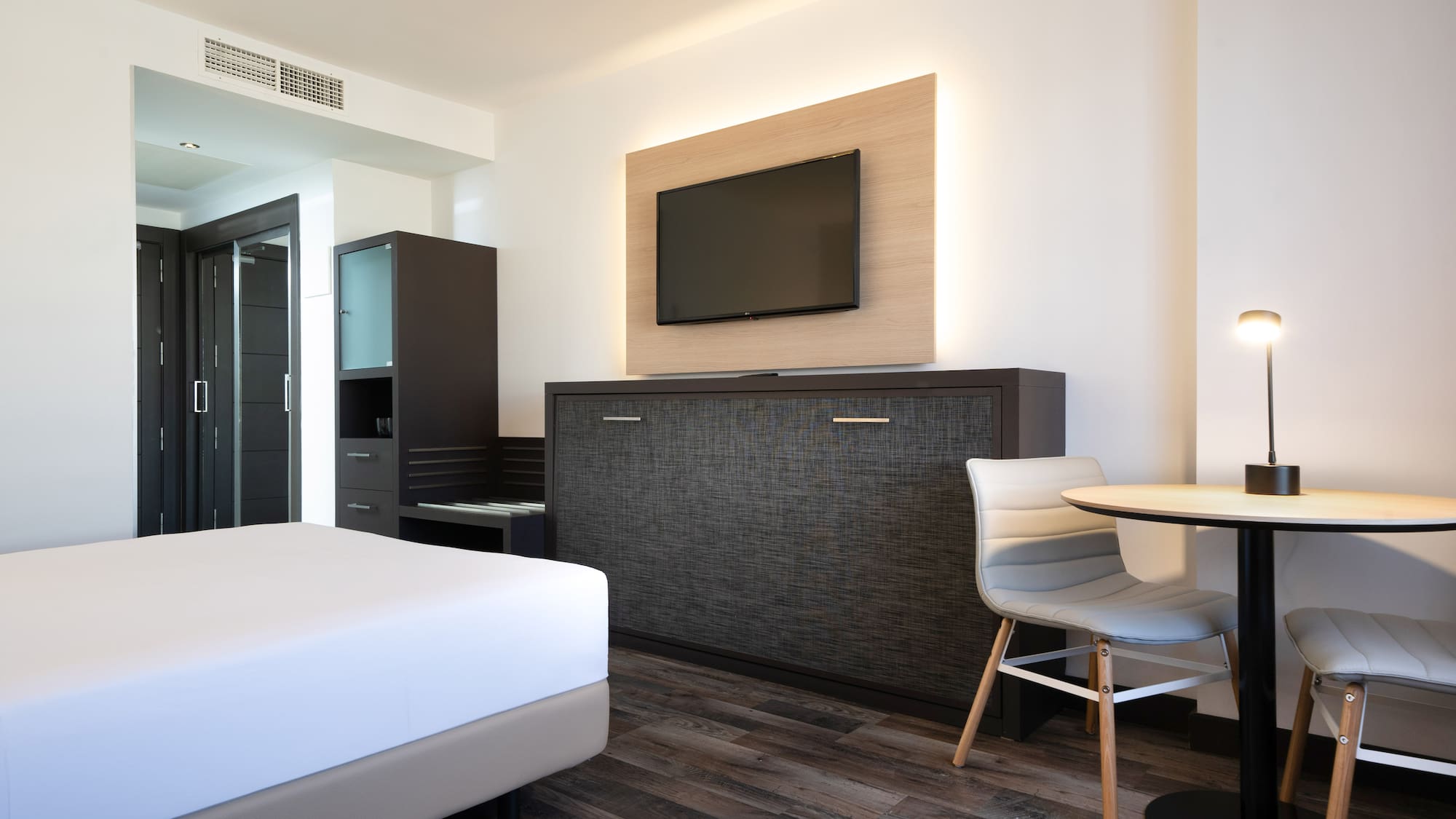 a room with a tv and a table