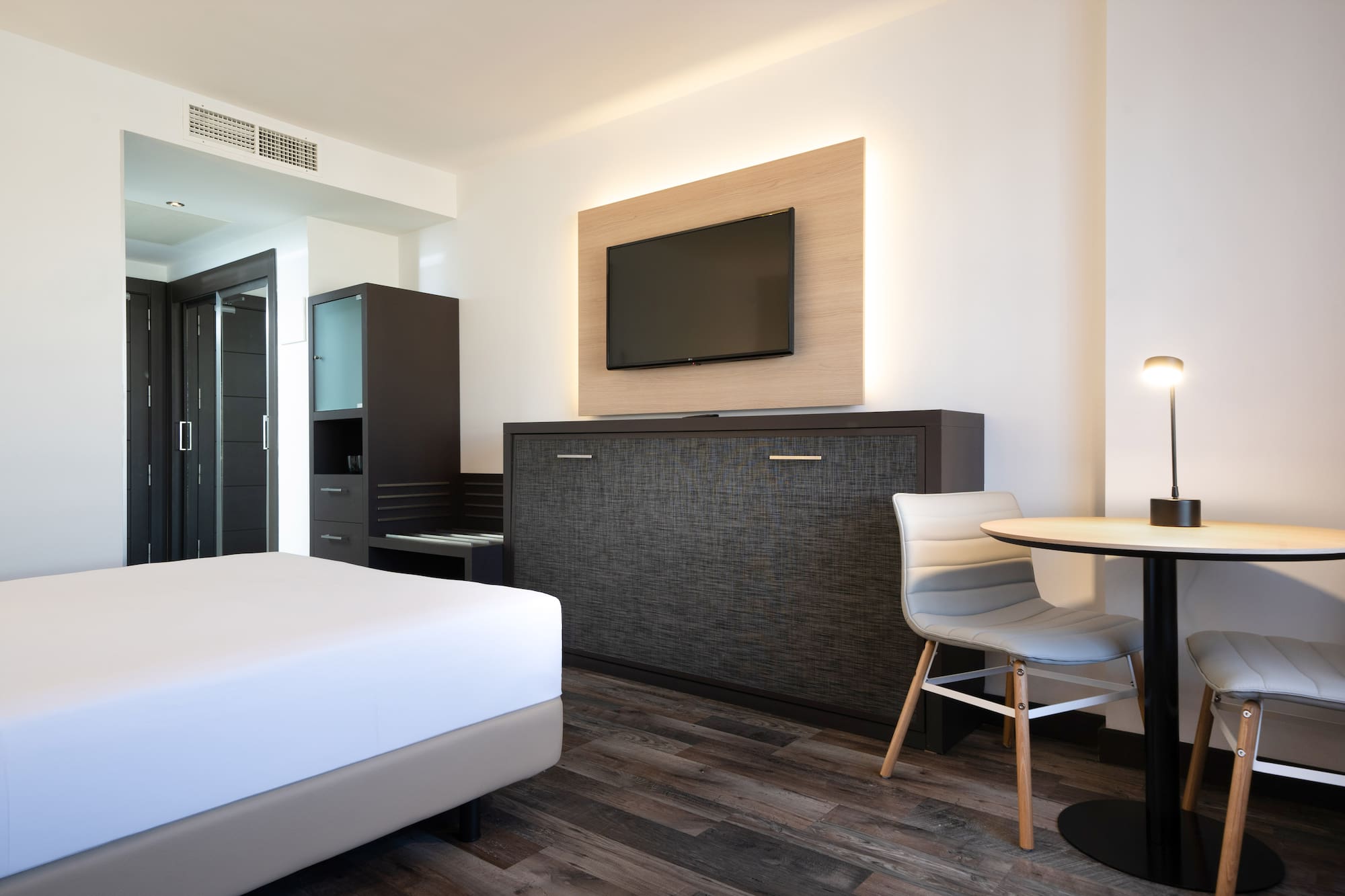 a room with a tv and a table