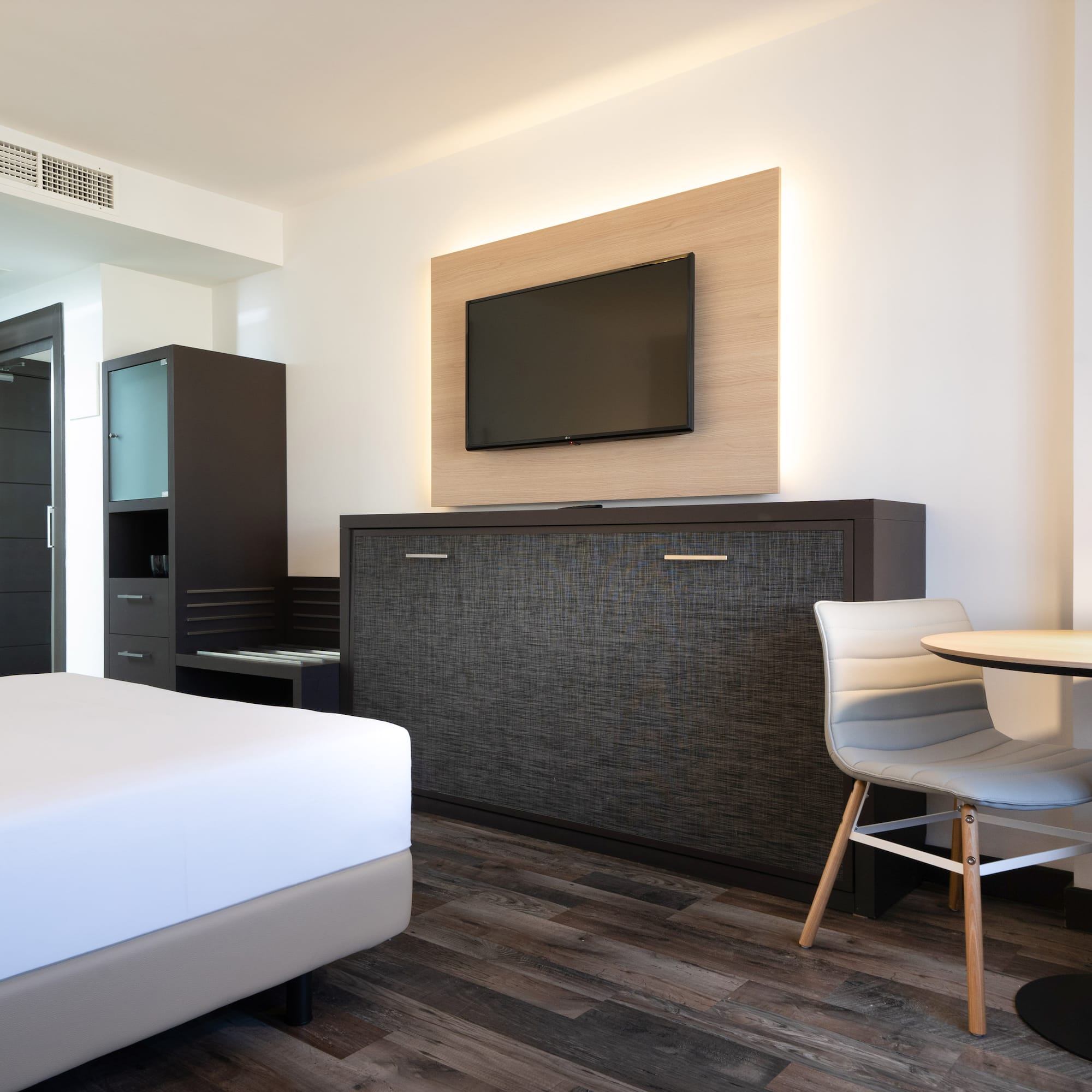 a room with a tv and a table