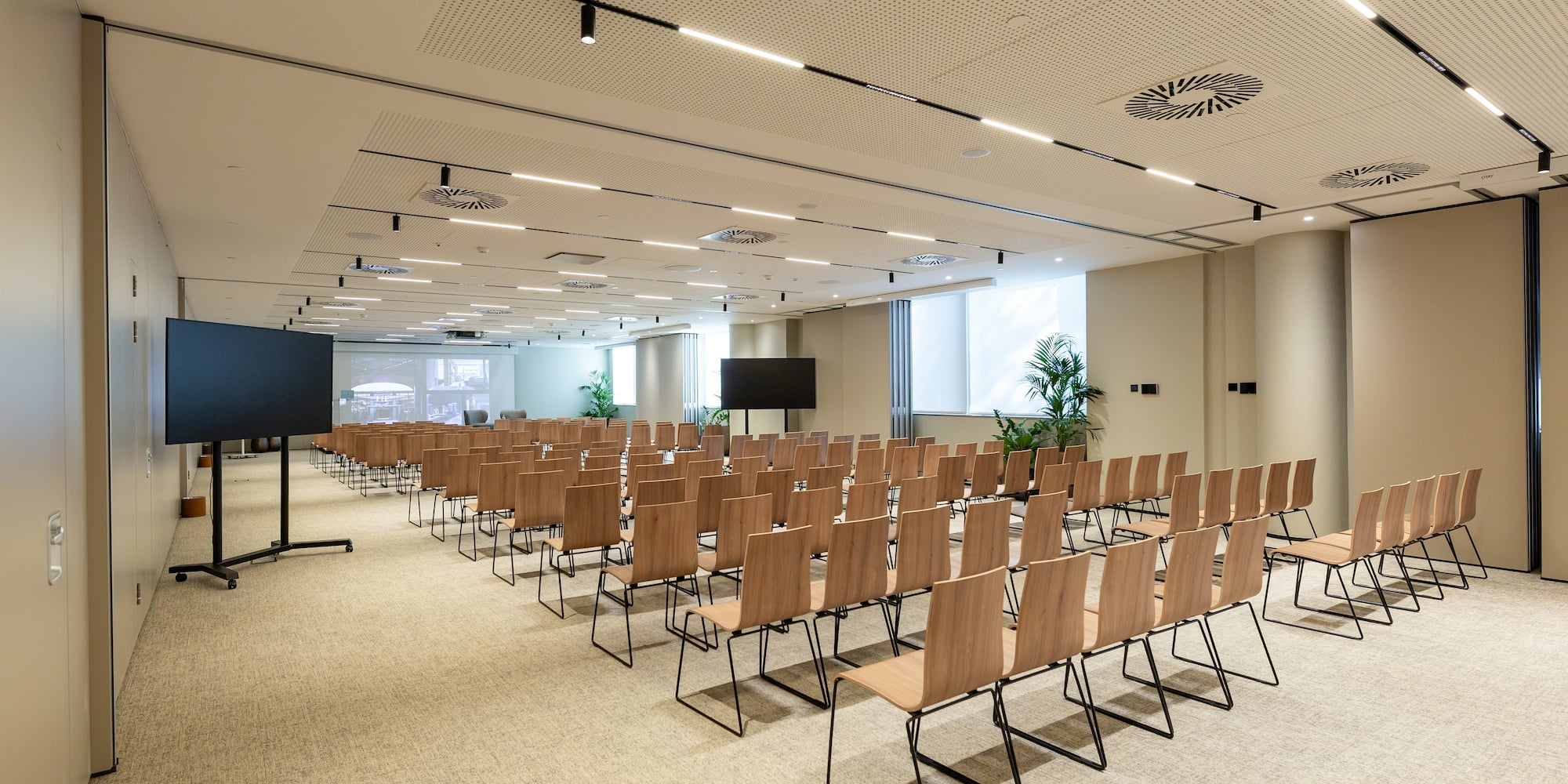 a room with rows of chairs