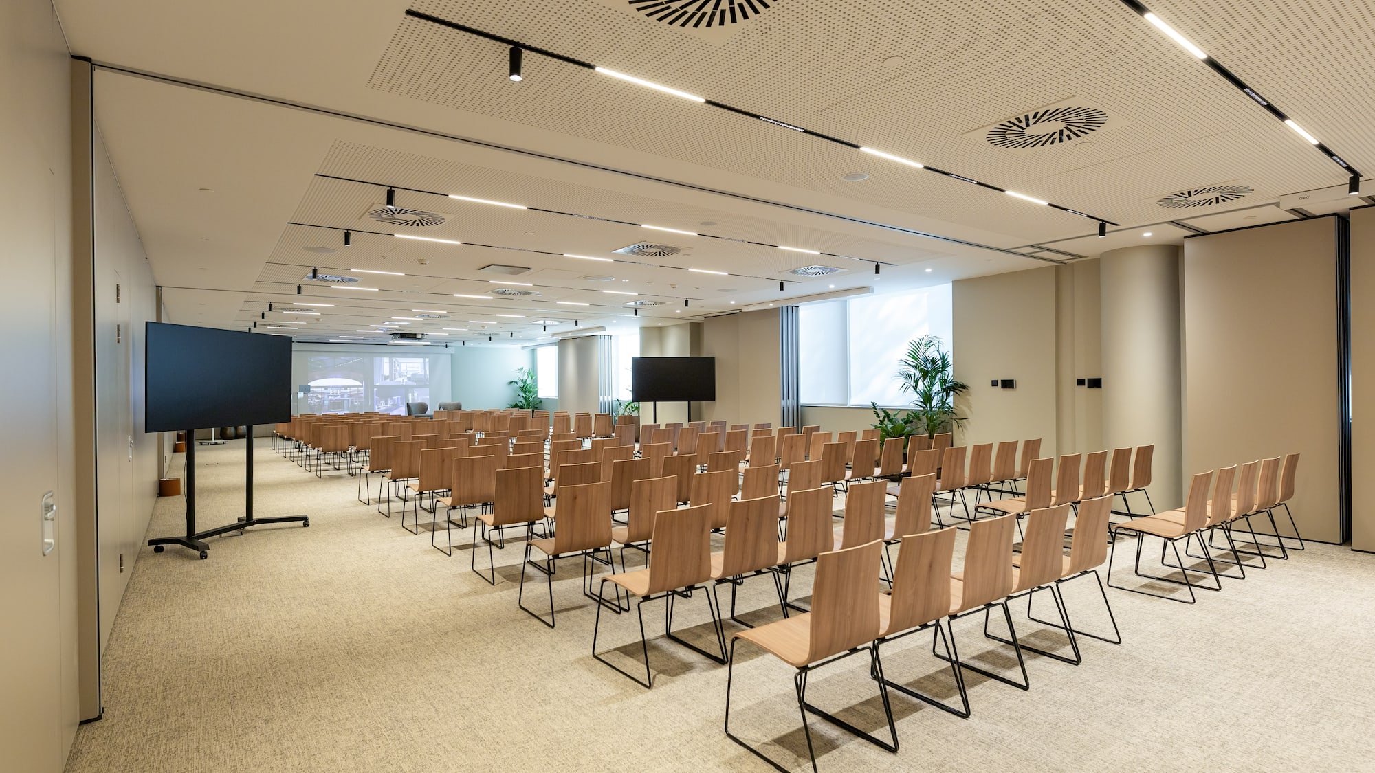 a room with rows of chairs