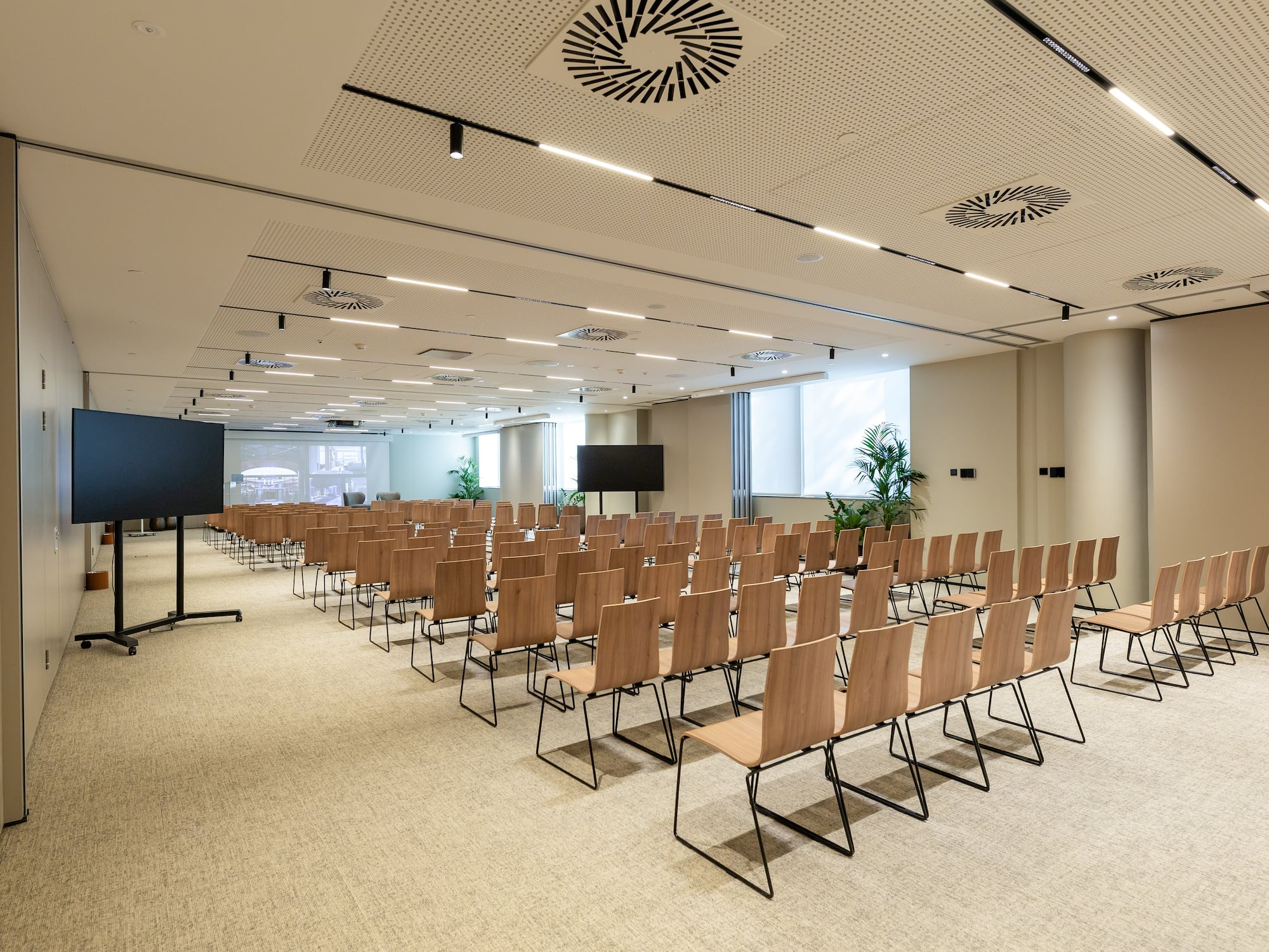 a room with rows of chairs