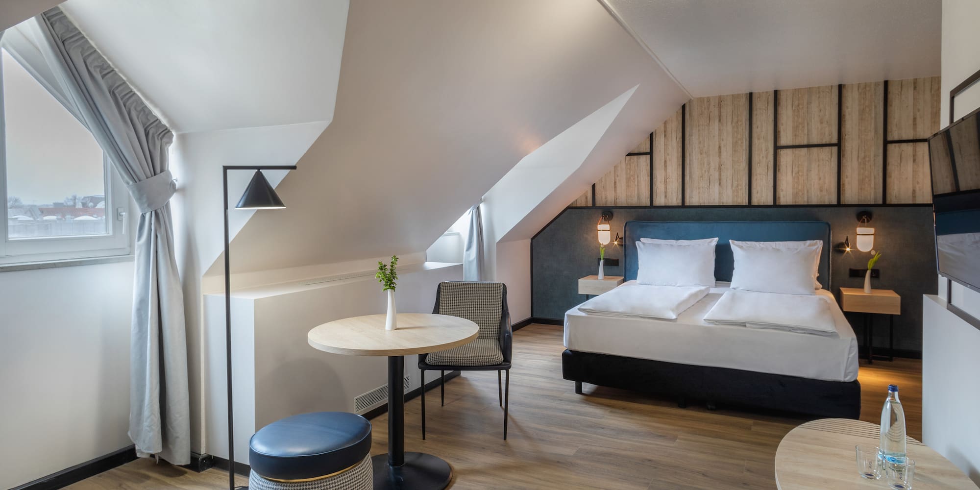 a room with a bed and a table