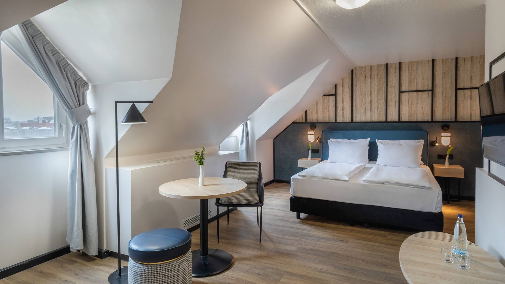 a room with a bed and a table