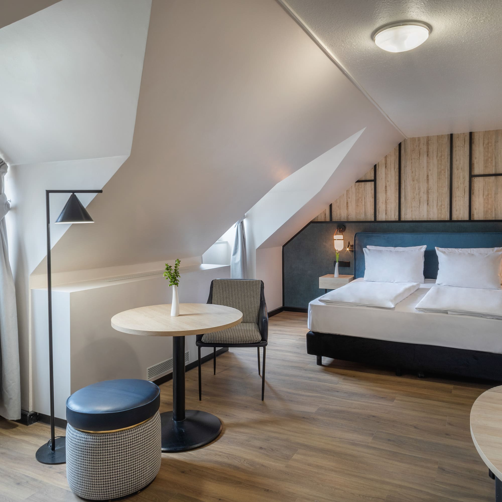 a room with a bed and a table