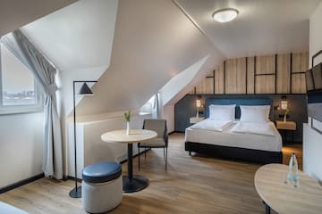 a room with a bed and a table