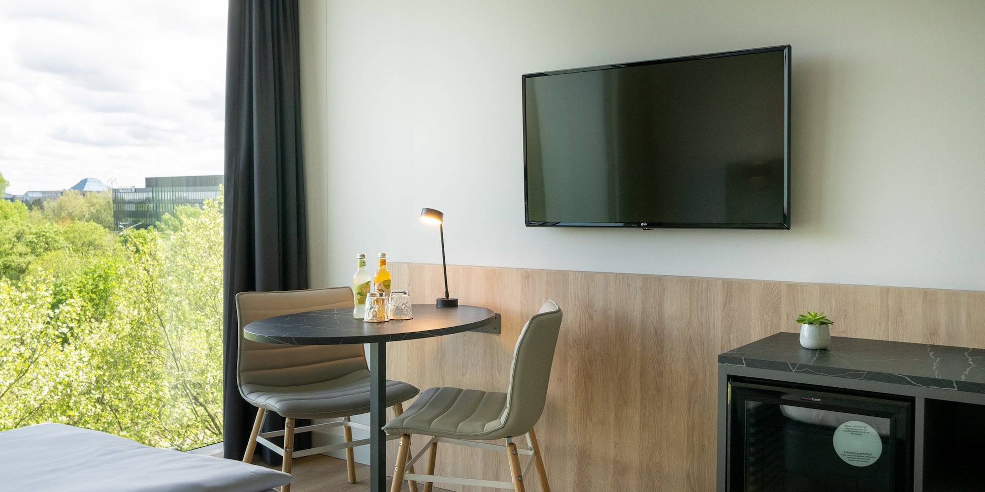 a room with a television and a table