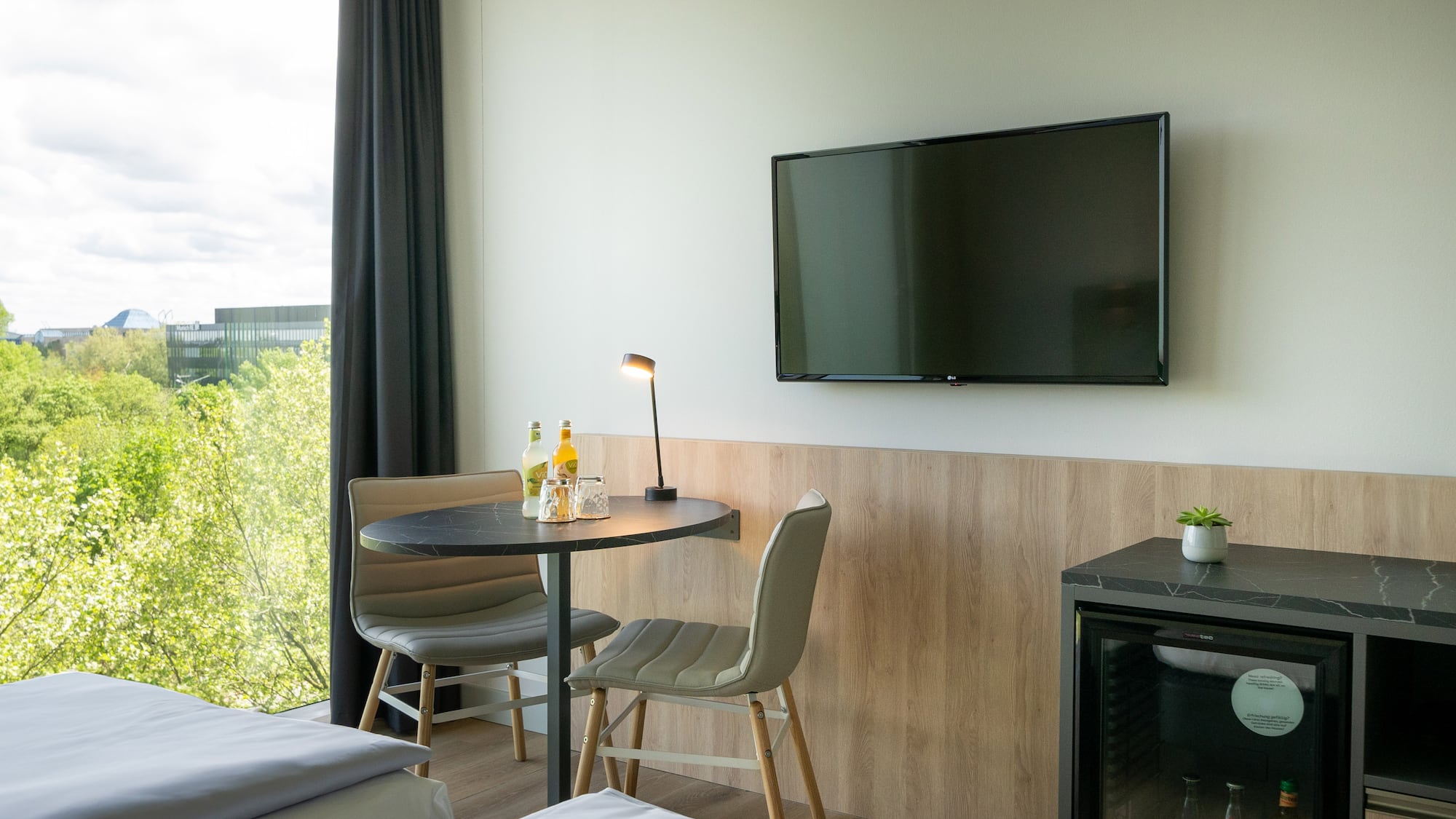 a room with a television and a table