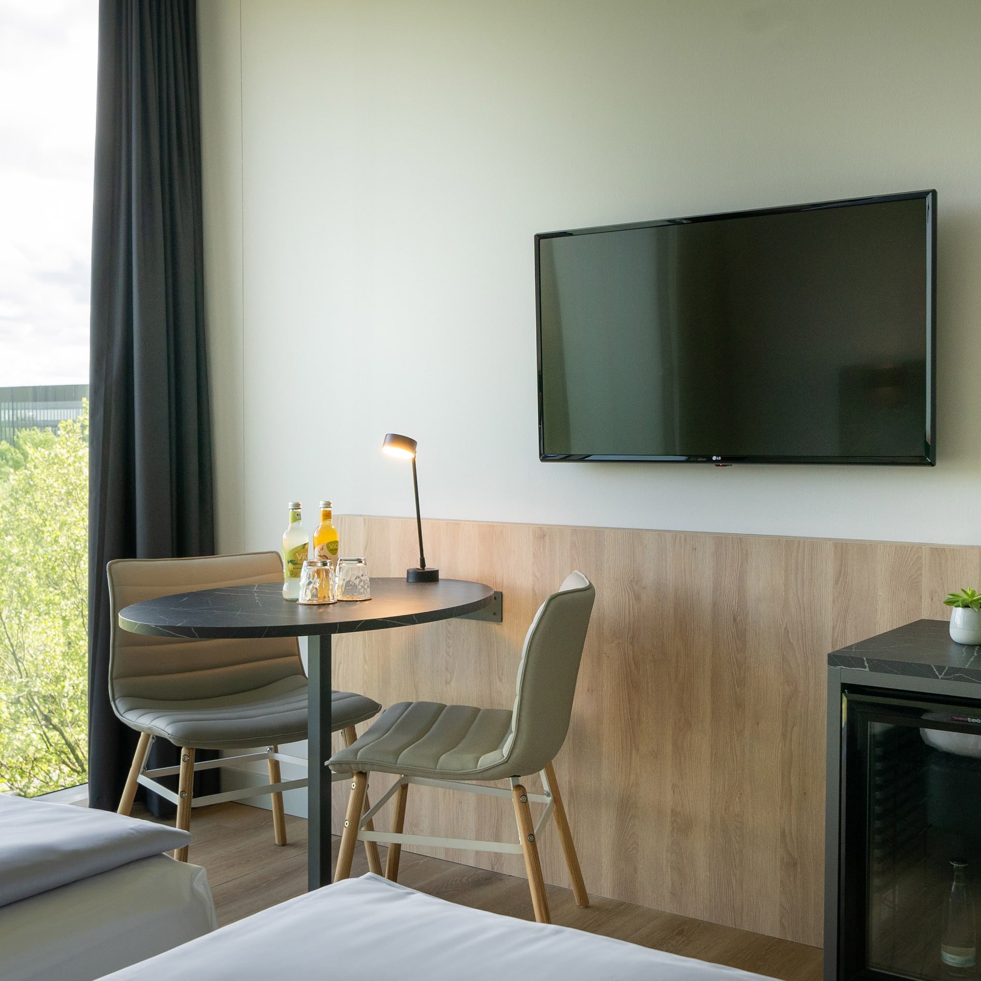 a room with a television and a table