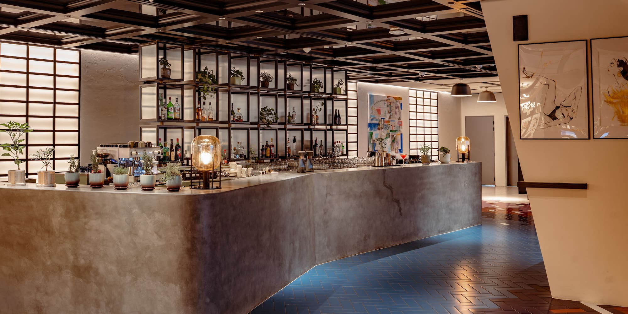 a bar with bottles on the counter
