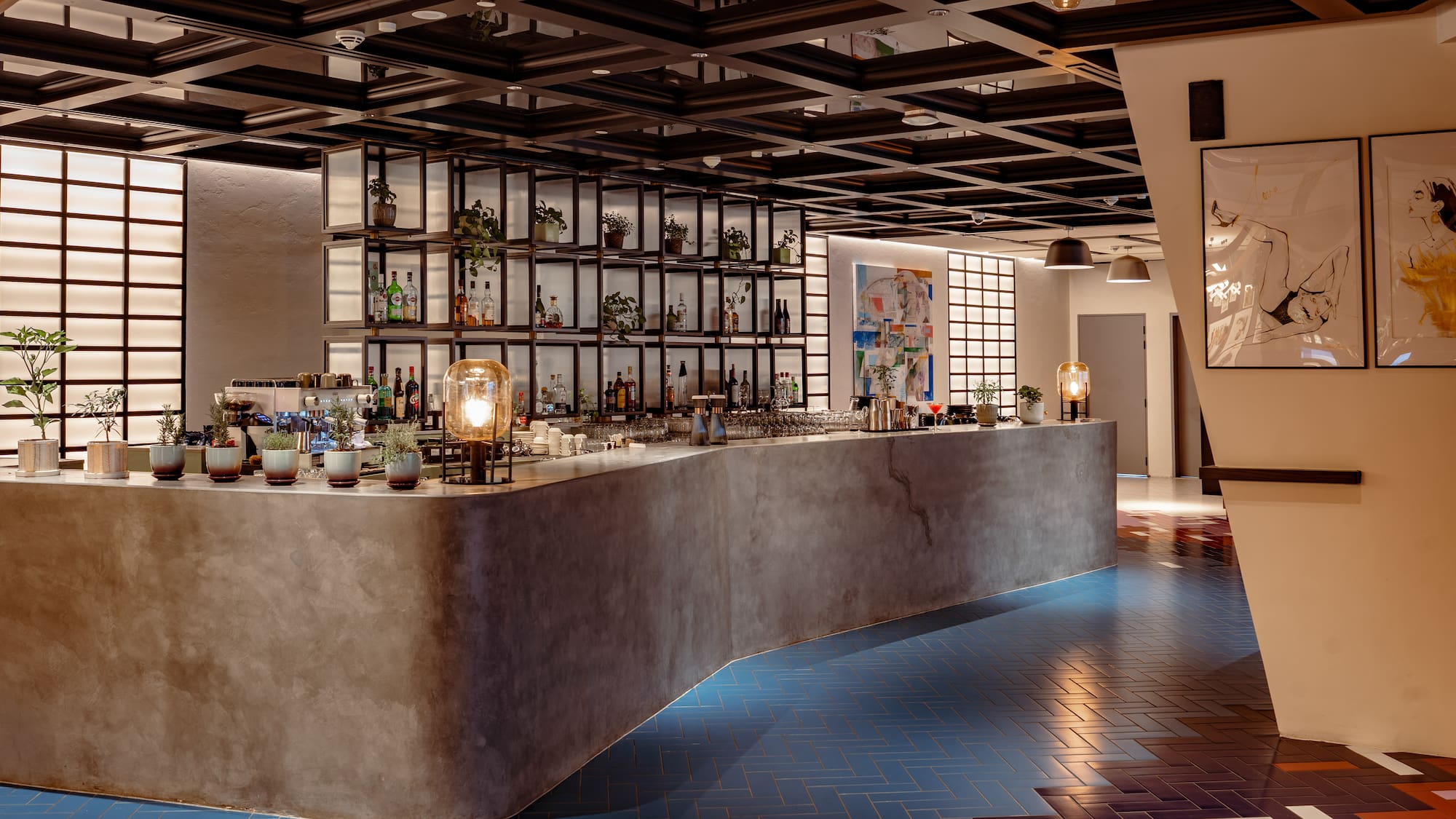 a bar with bottles on the counter
