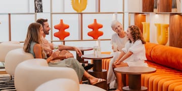 a group of people sitting on a couch