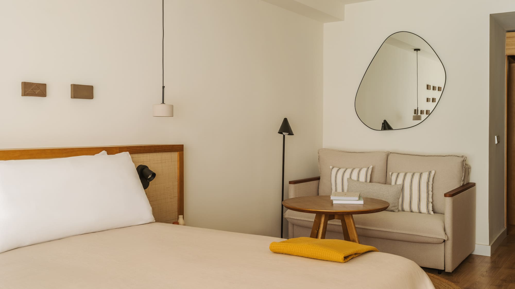 a room with a bed and a couch