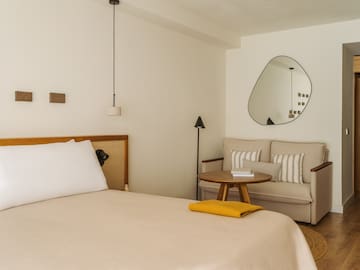 a room with a bed and a couch