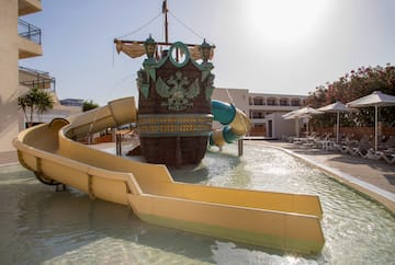 a water park with a ship and slides