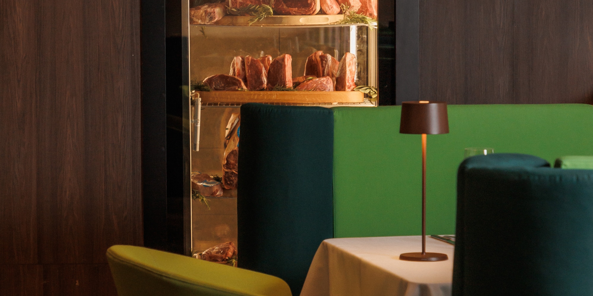 a display case of meats in a restaurant