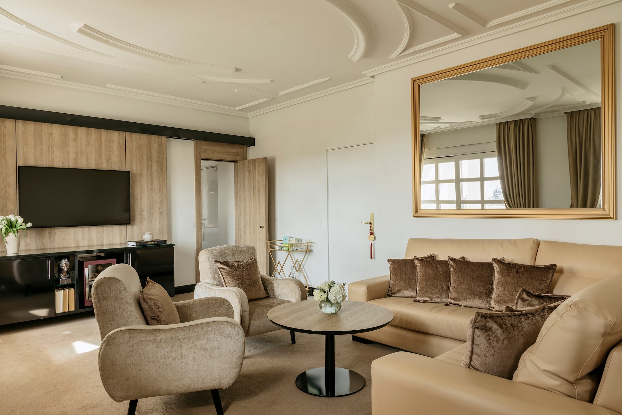 a living room with a couch and a table