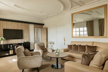 a living room with a couch and a table