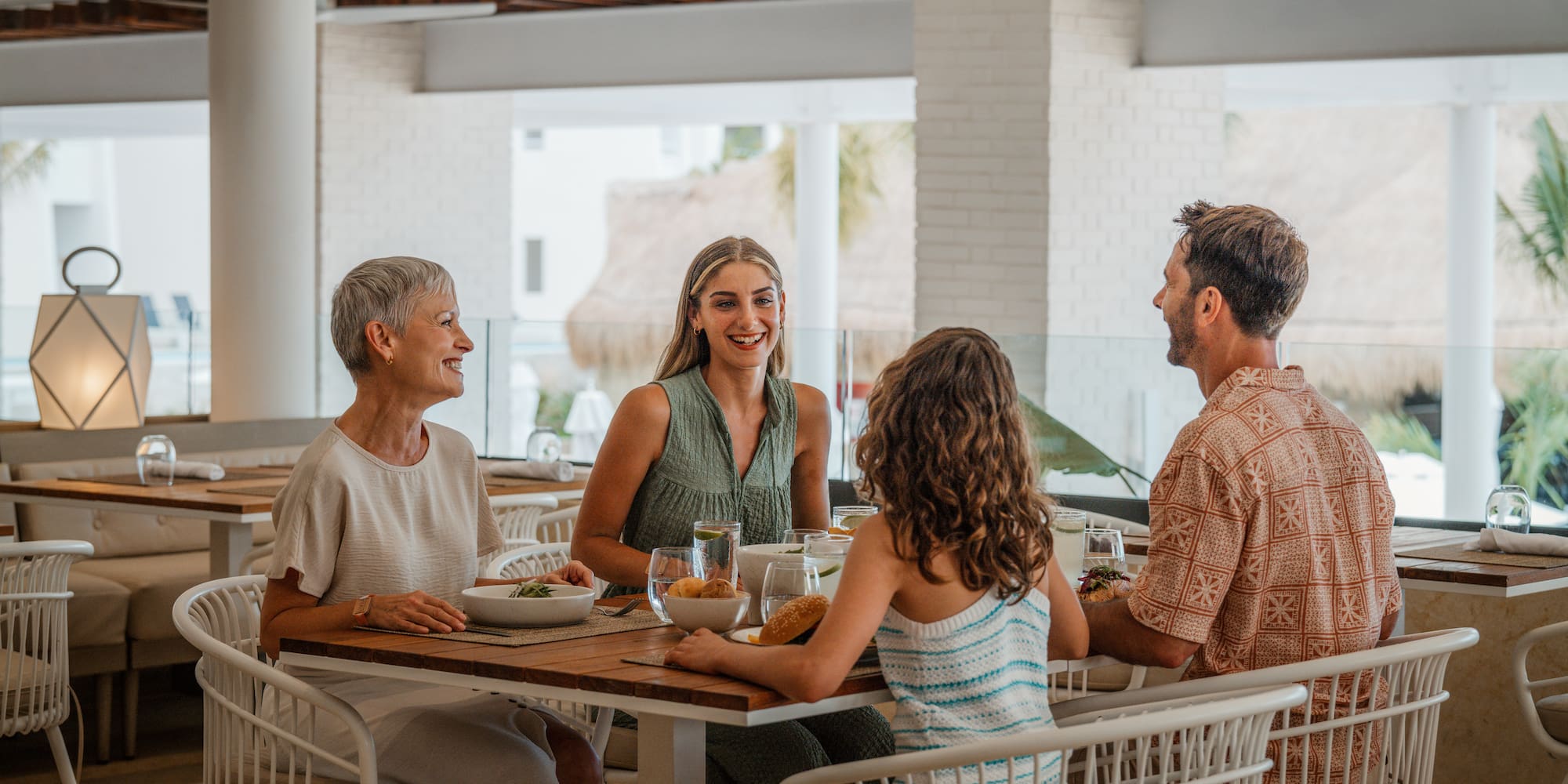 a group of people sitting at a table