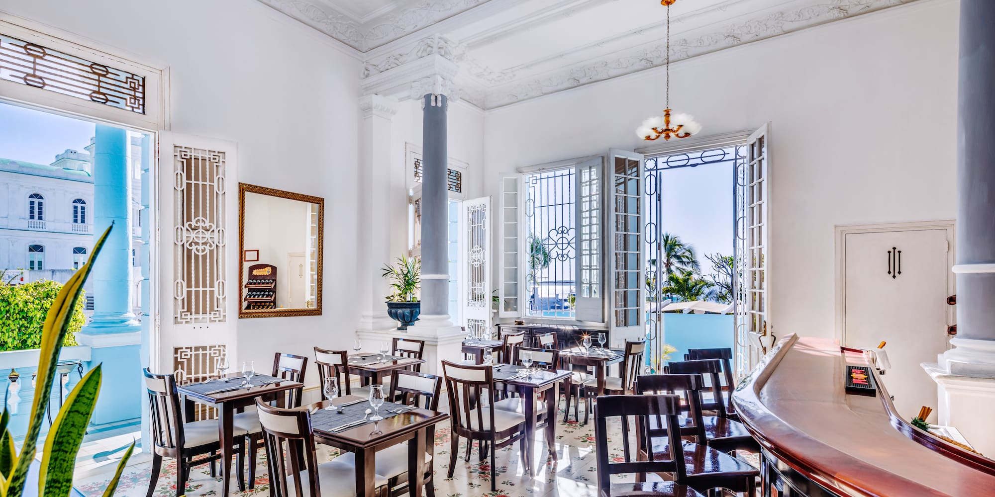 a room with tables and chairs