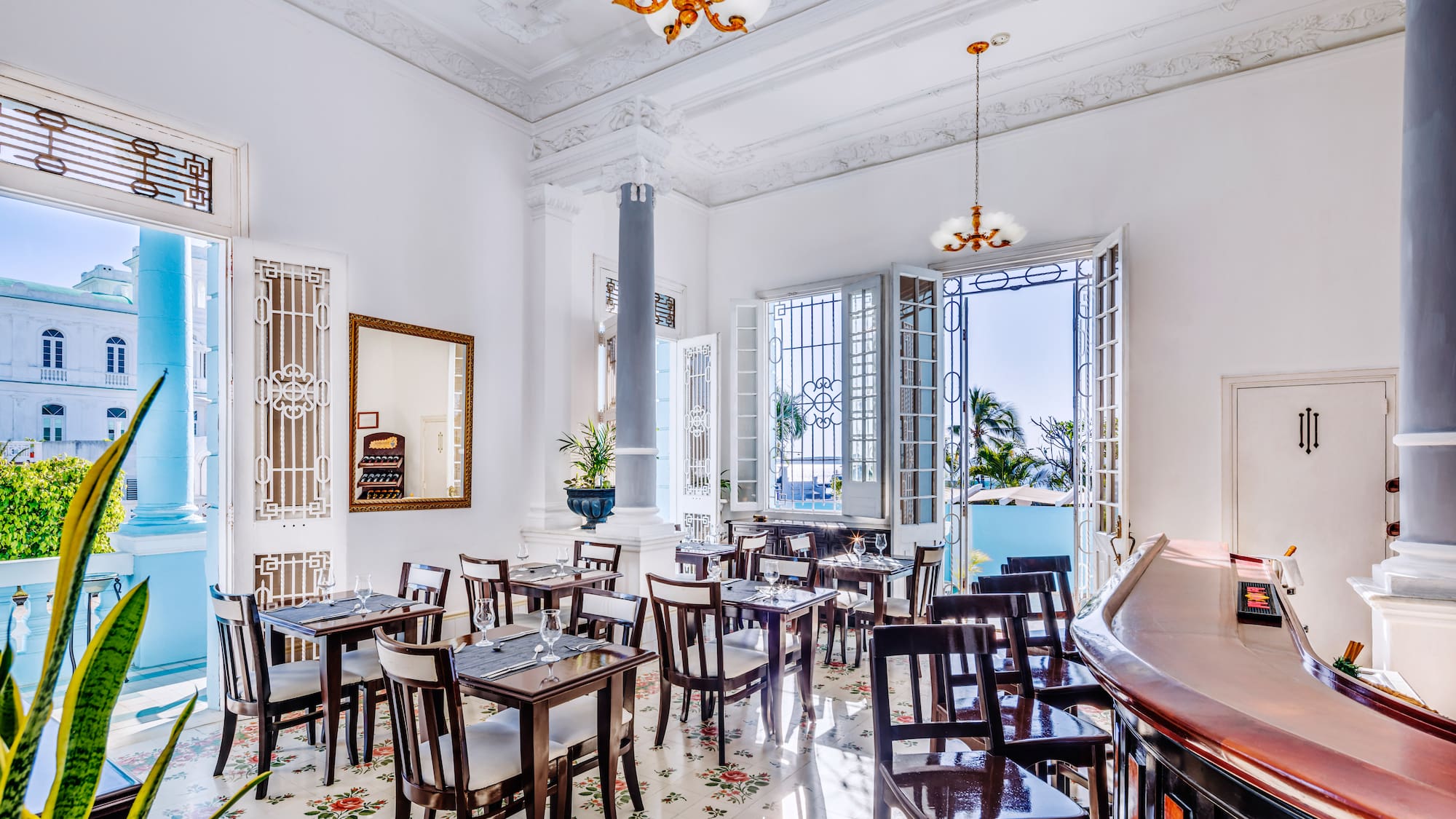 a room with tables and chairs