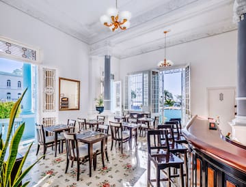 a room with tables and chairs