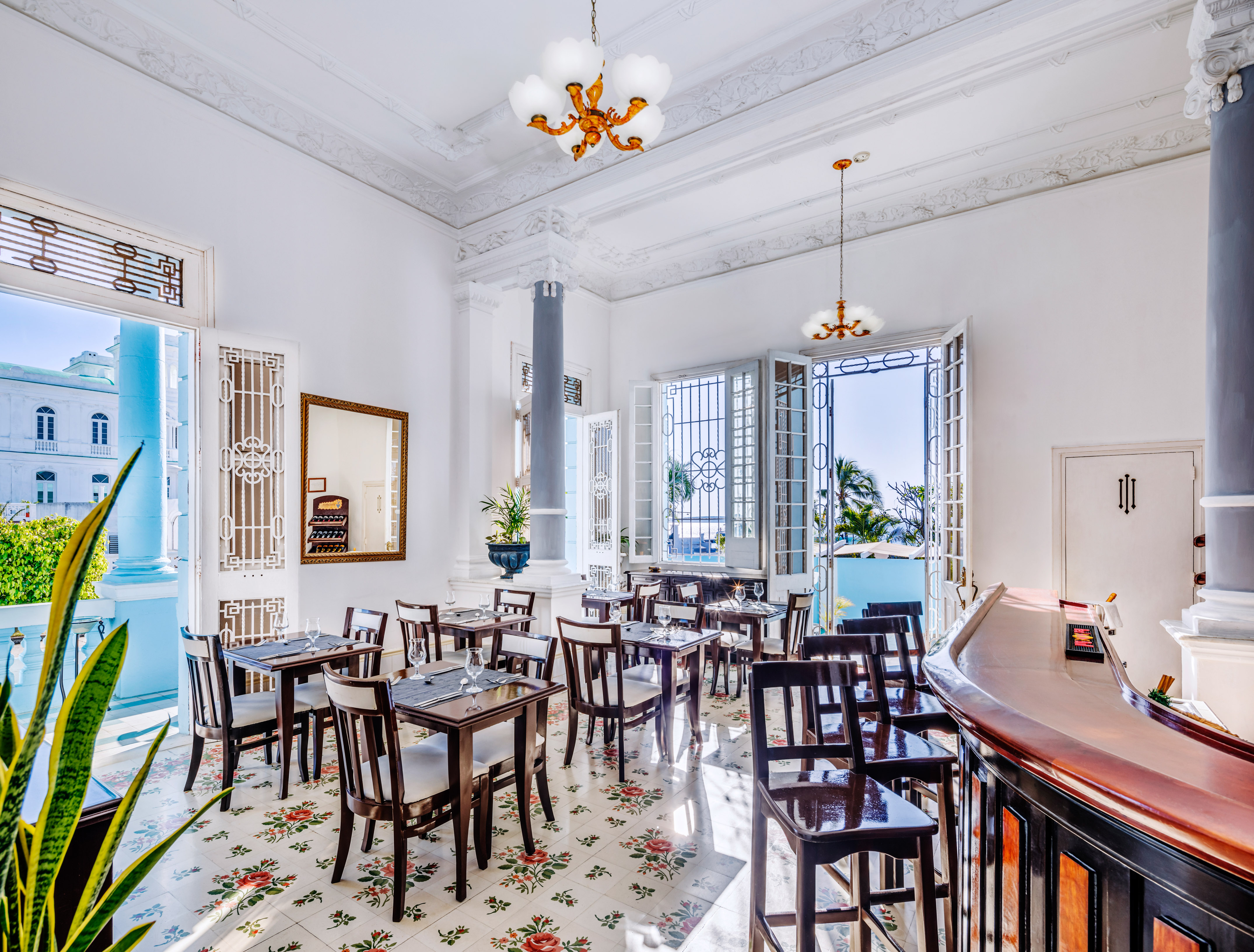 a room with tables and chairs