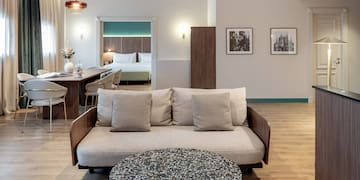 a living room with a couch and a table