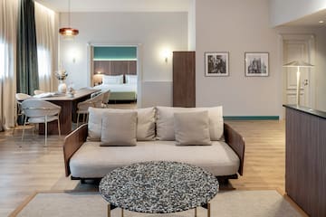 a living room with a couch and a table