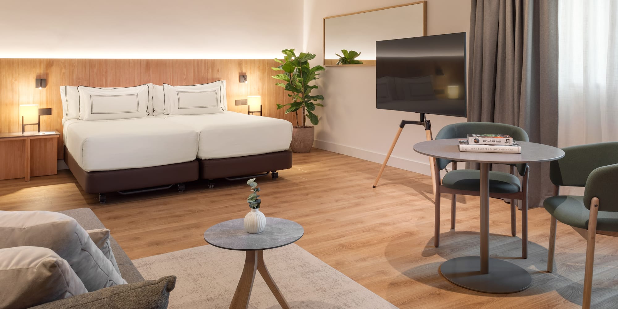 a room with a bed and a tv