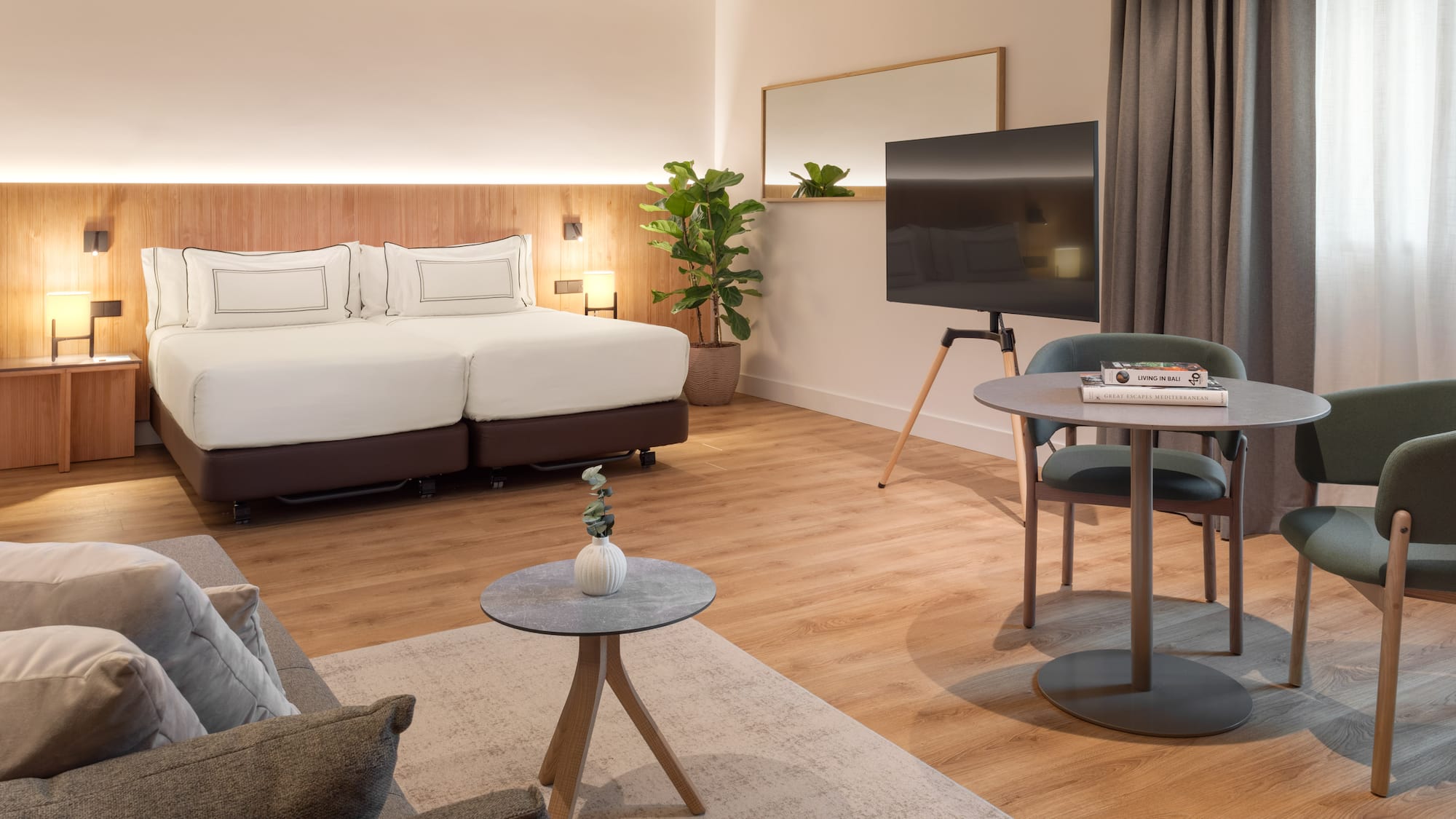 a room with a bed and a tv