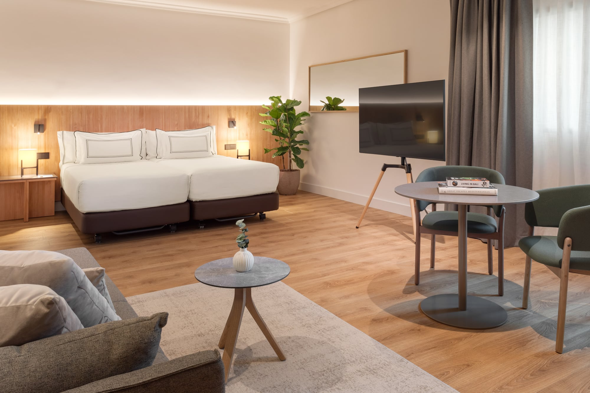 a room with a bed and a tv