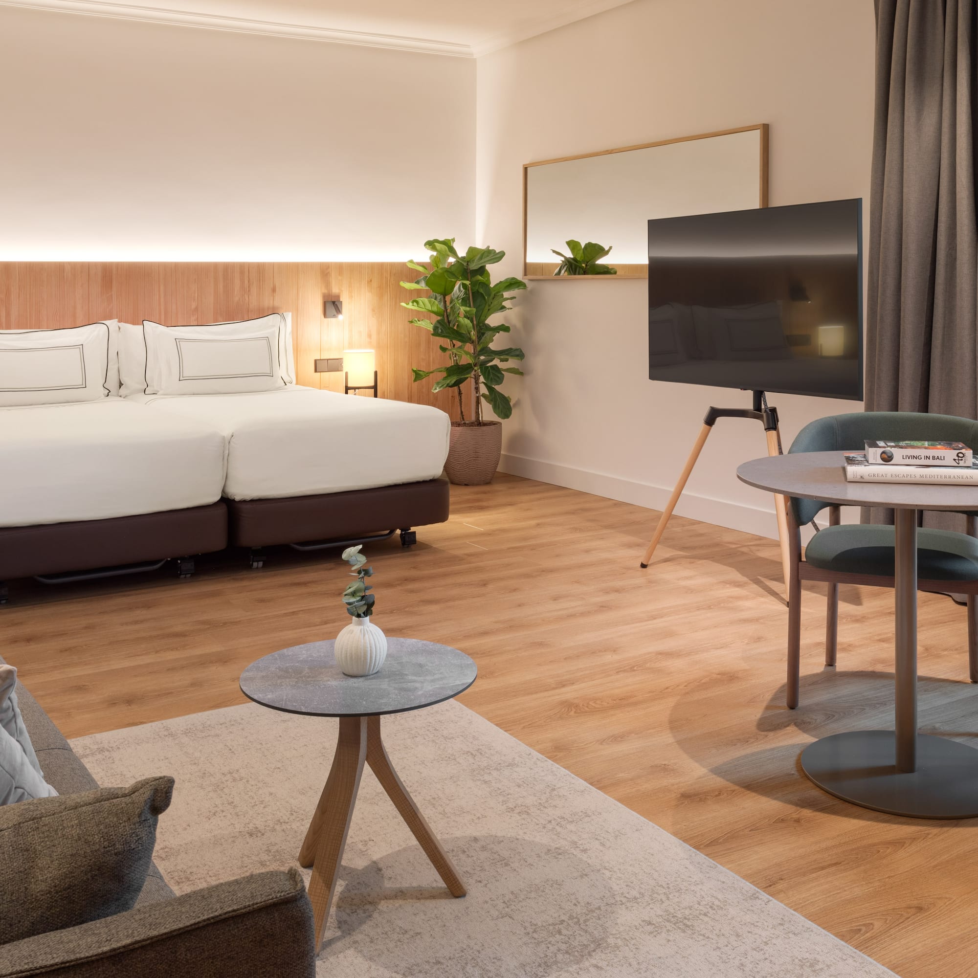 a room with a bed and a tv