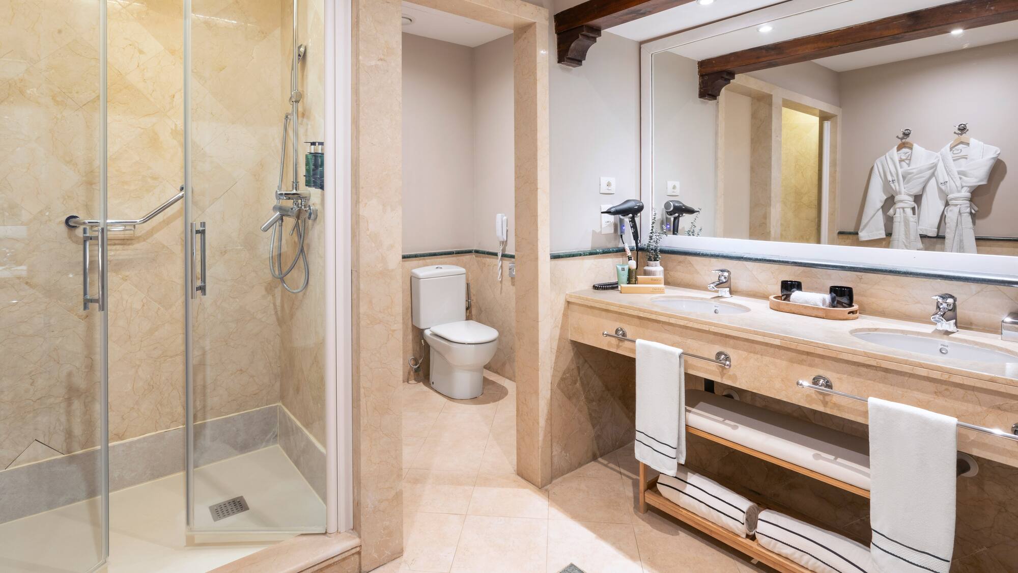 a bathroom with a shower and sink