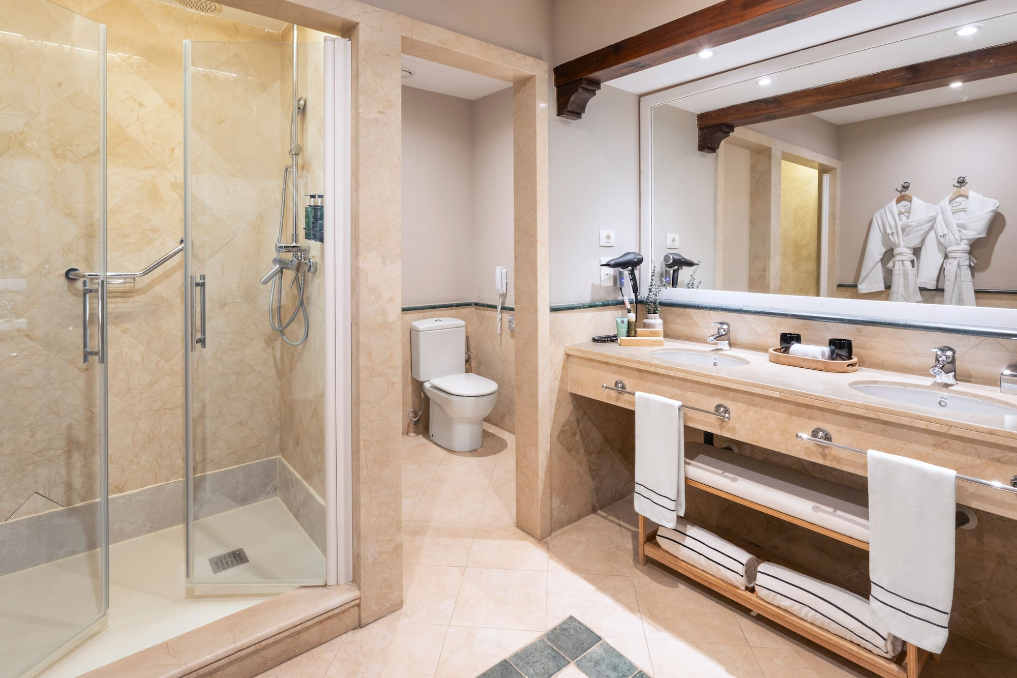 a bathroom with a shower and sink