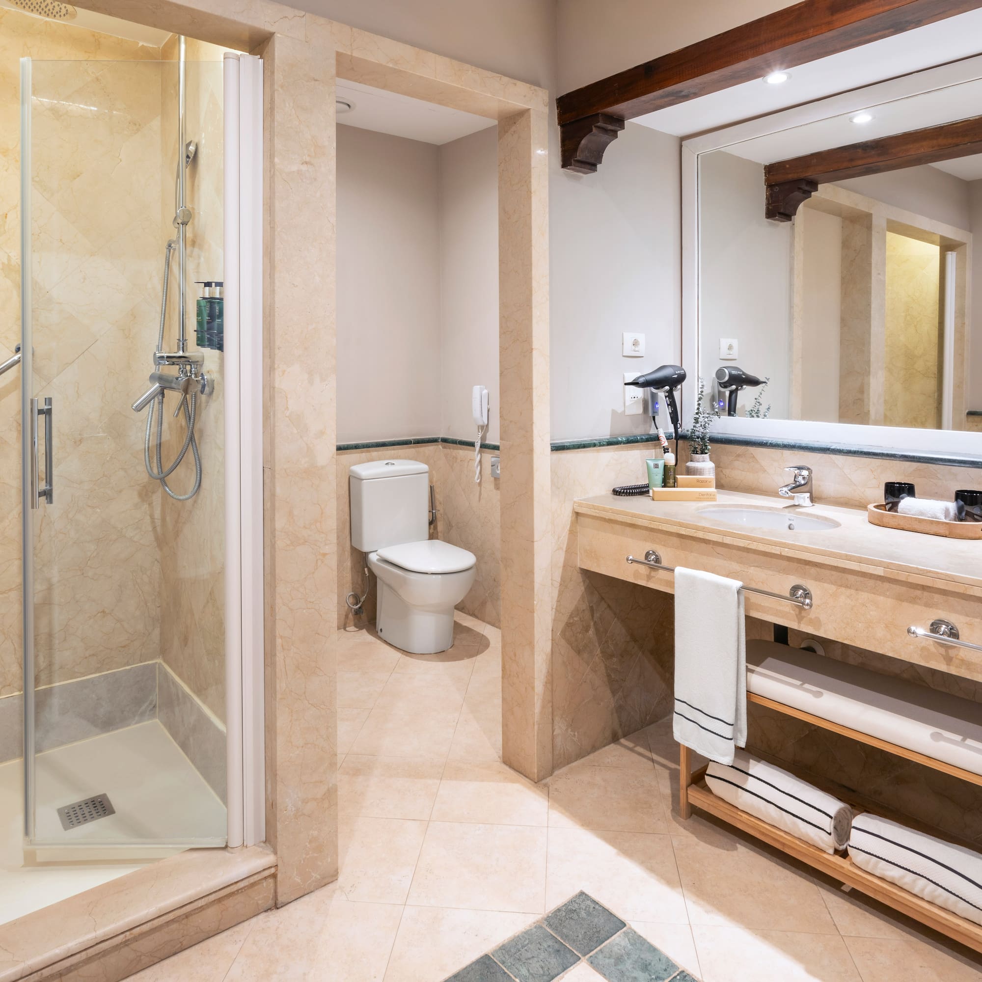 a bathroom with a shower and sink