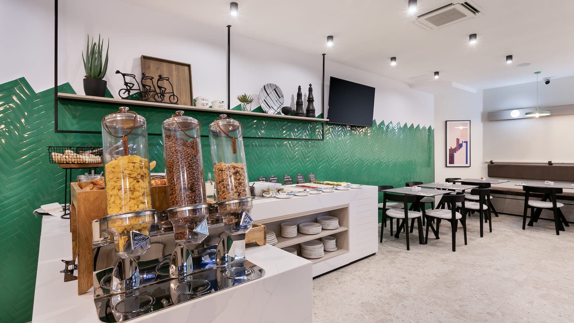 a room with a variety of cereals and a green wall