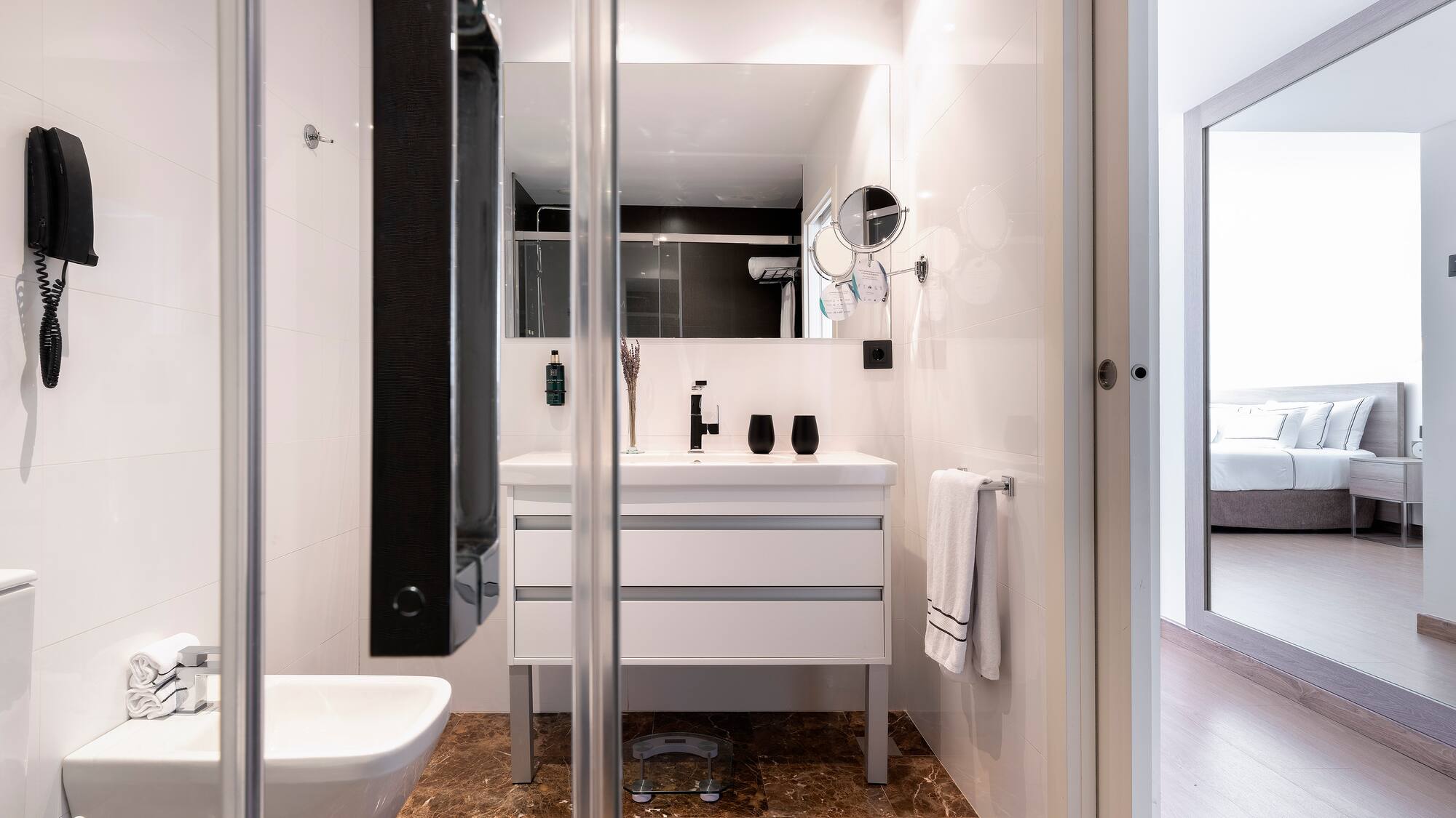 a bathroom with a glass door