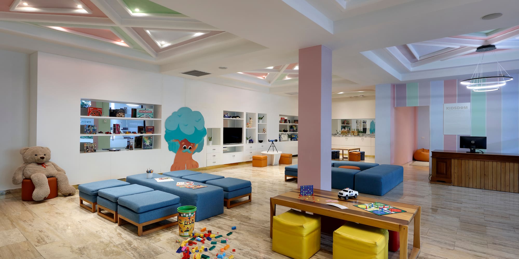 a room with a large table and benches