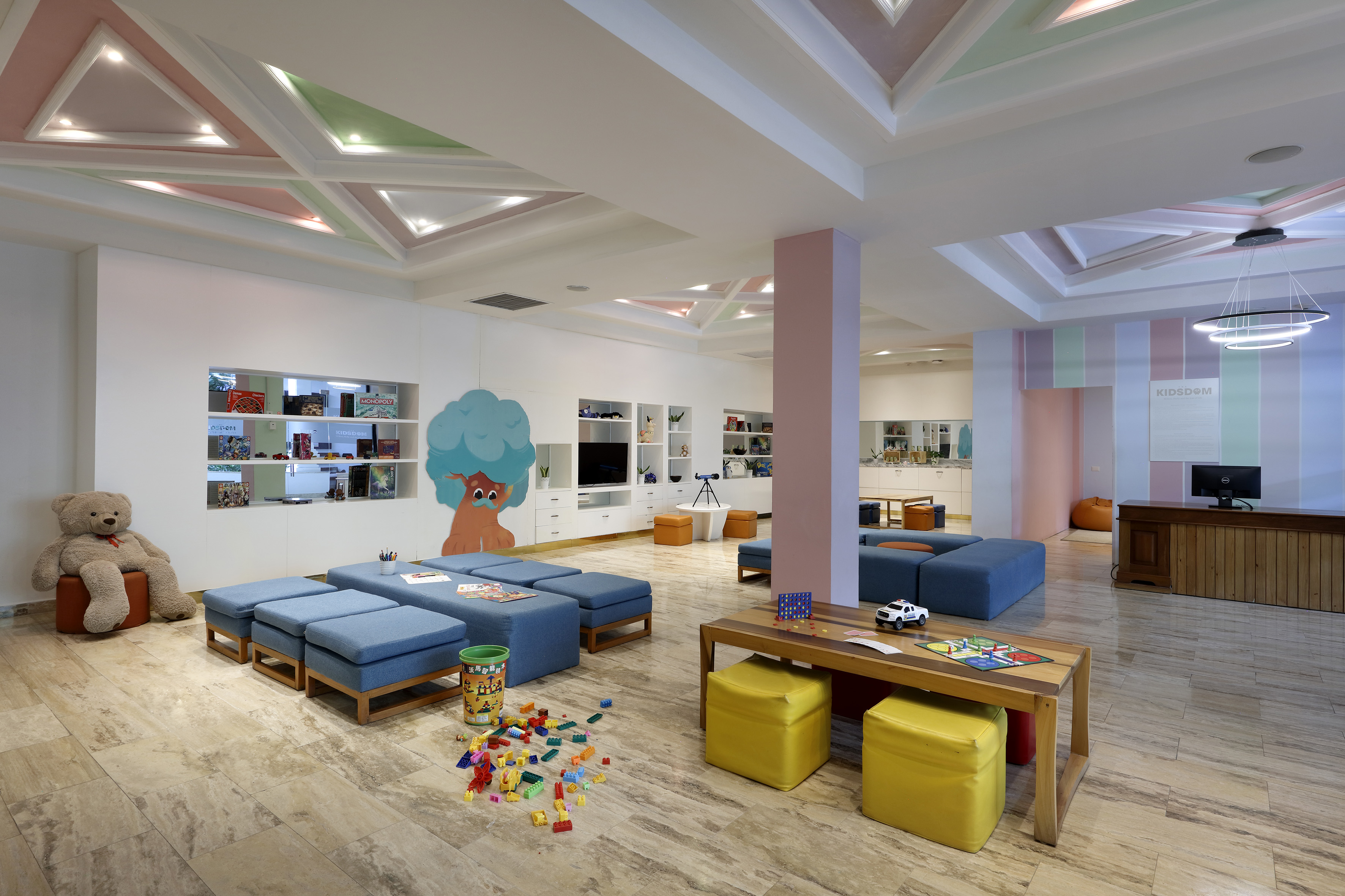 a room with a large table and benches