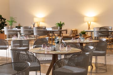 a room with tables and chairs