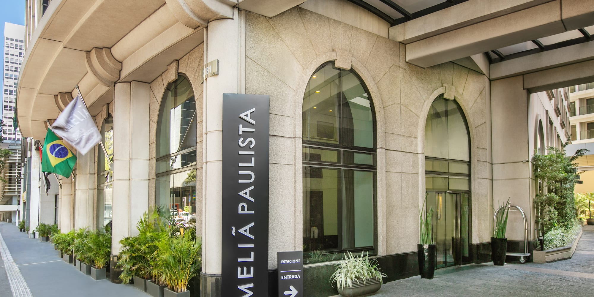 a building with arched windows and a sign