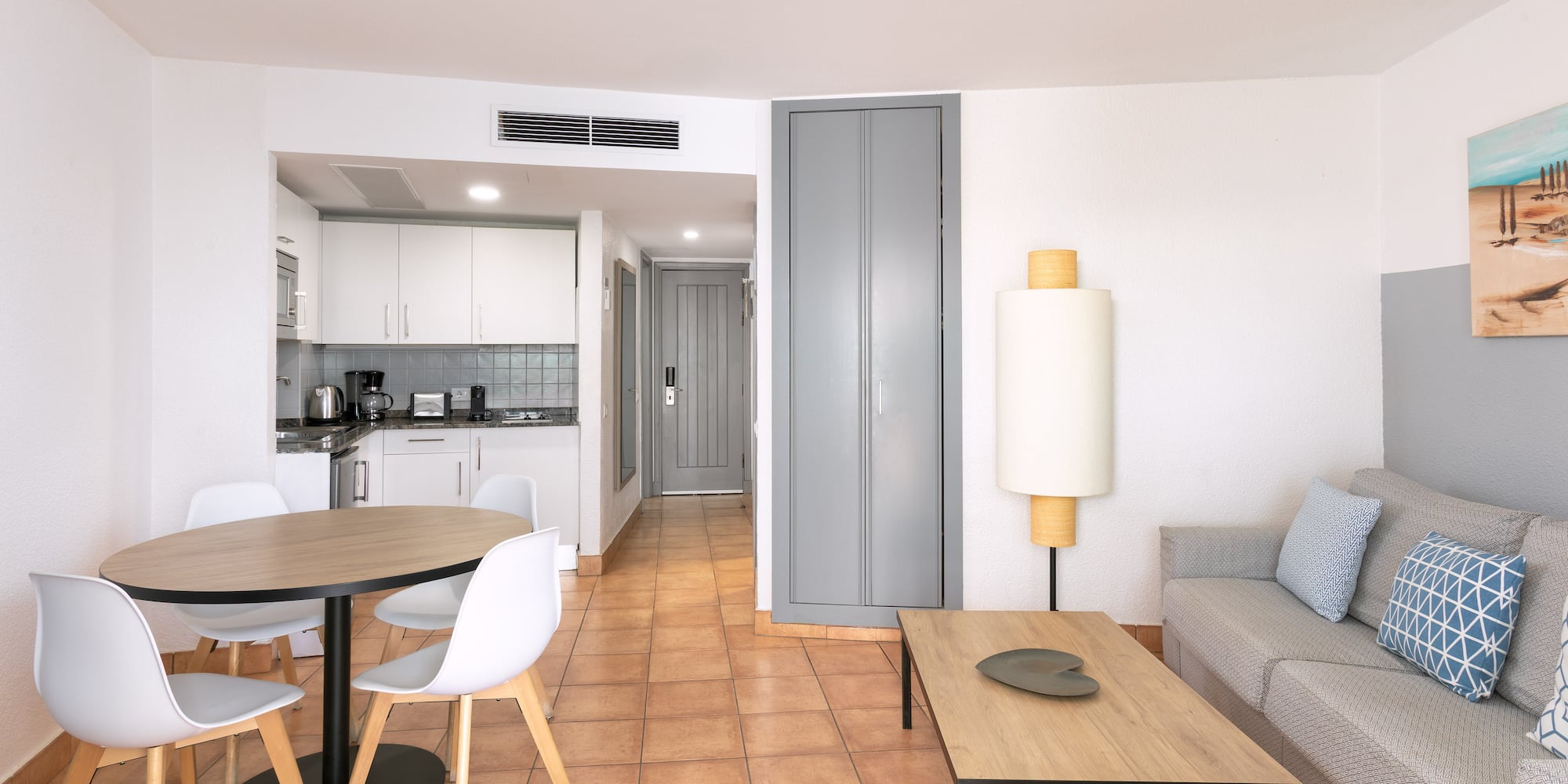 a living room with a couch and a table