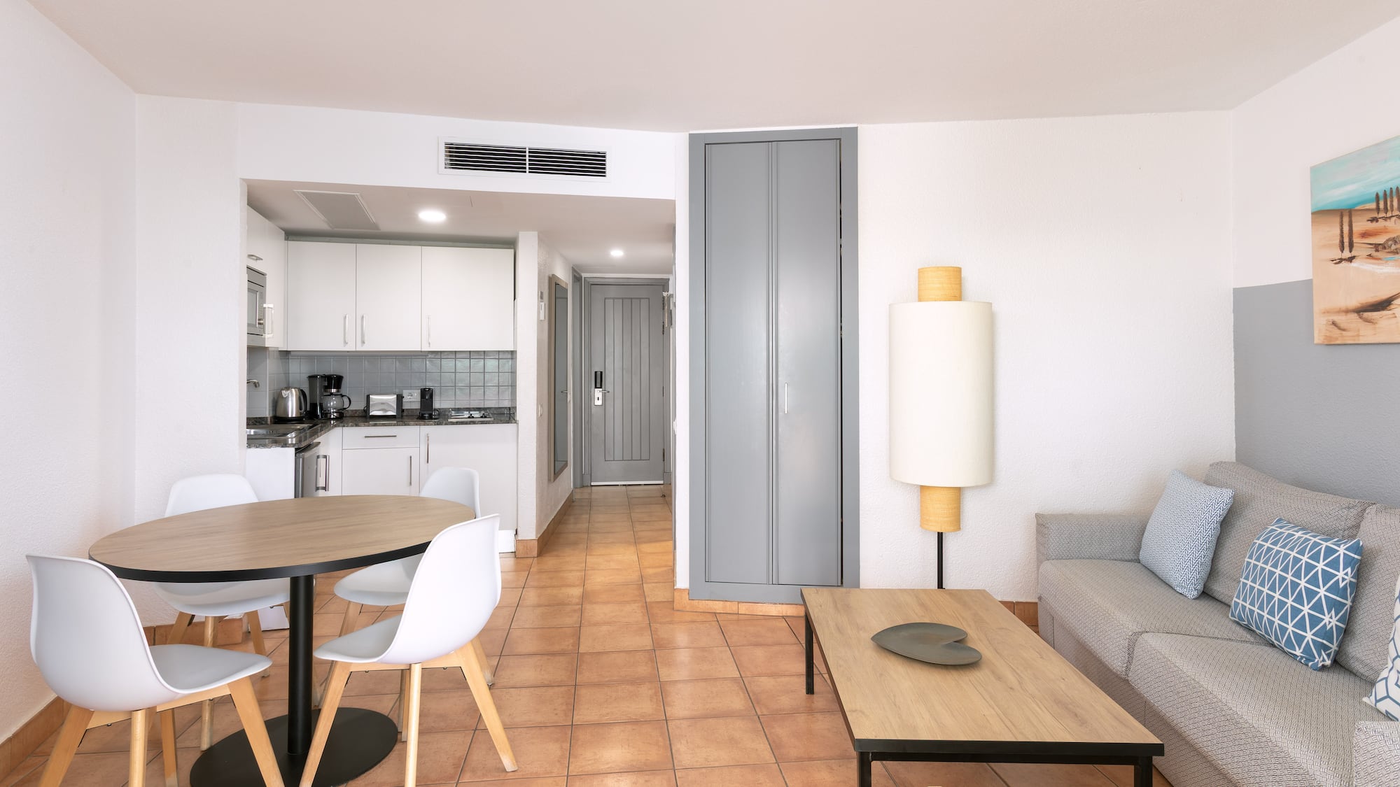 a living room with a couch and a table