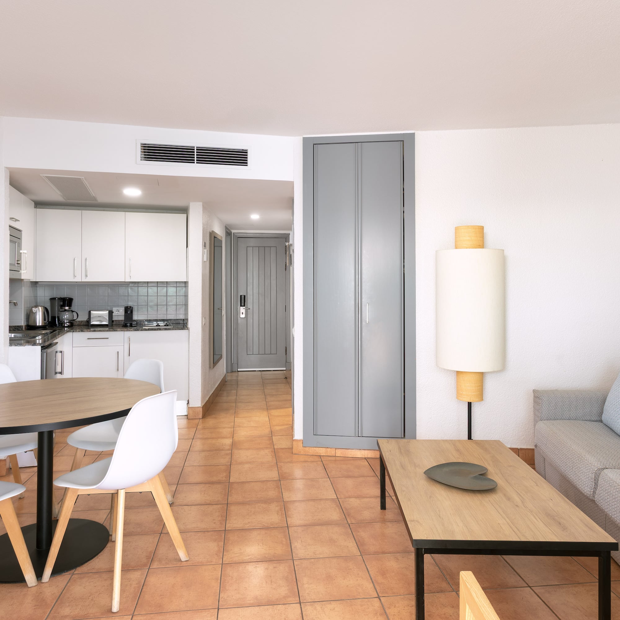 a living room with a couch and a table