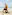 Joyful family playing piggyback on a sandy beach with blue ocean.