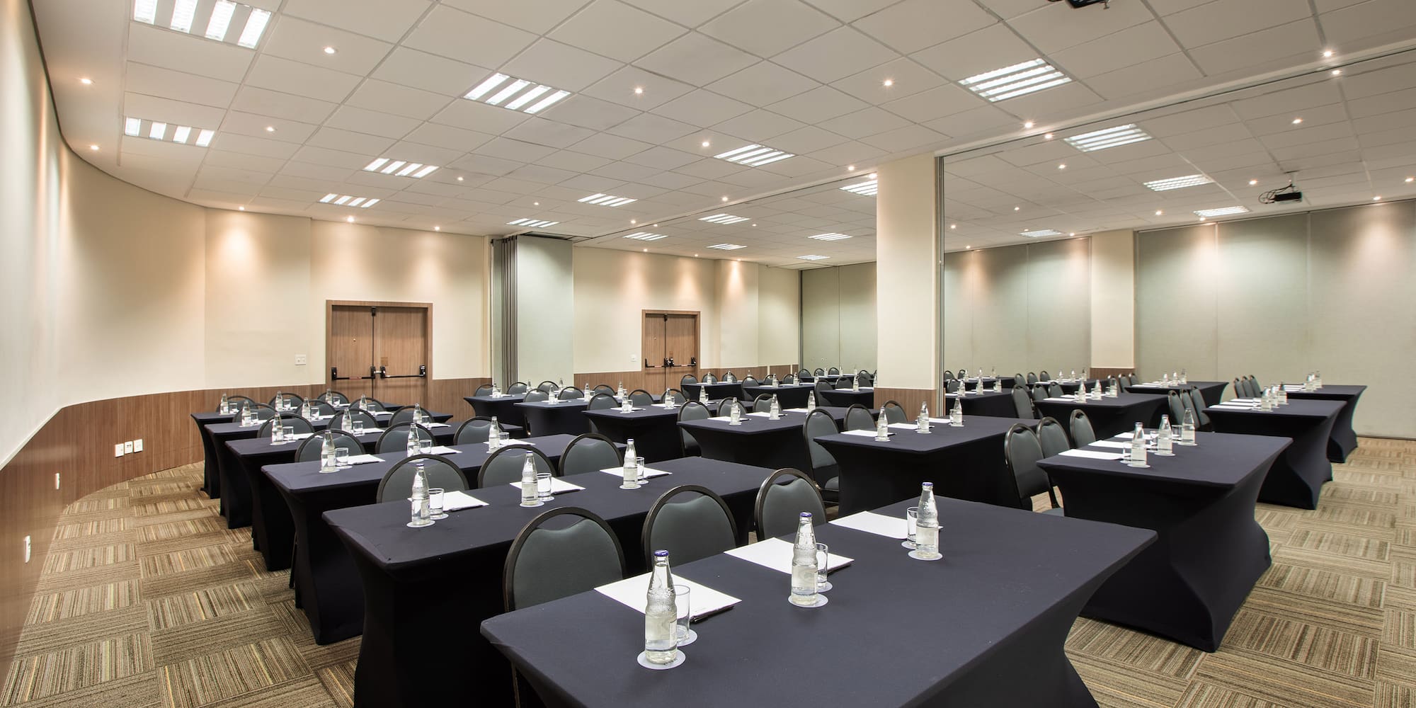 a room with tables and chairs