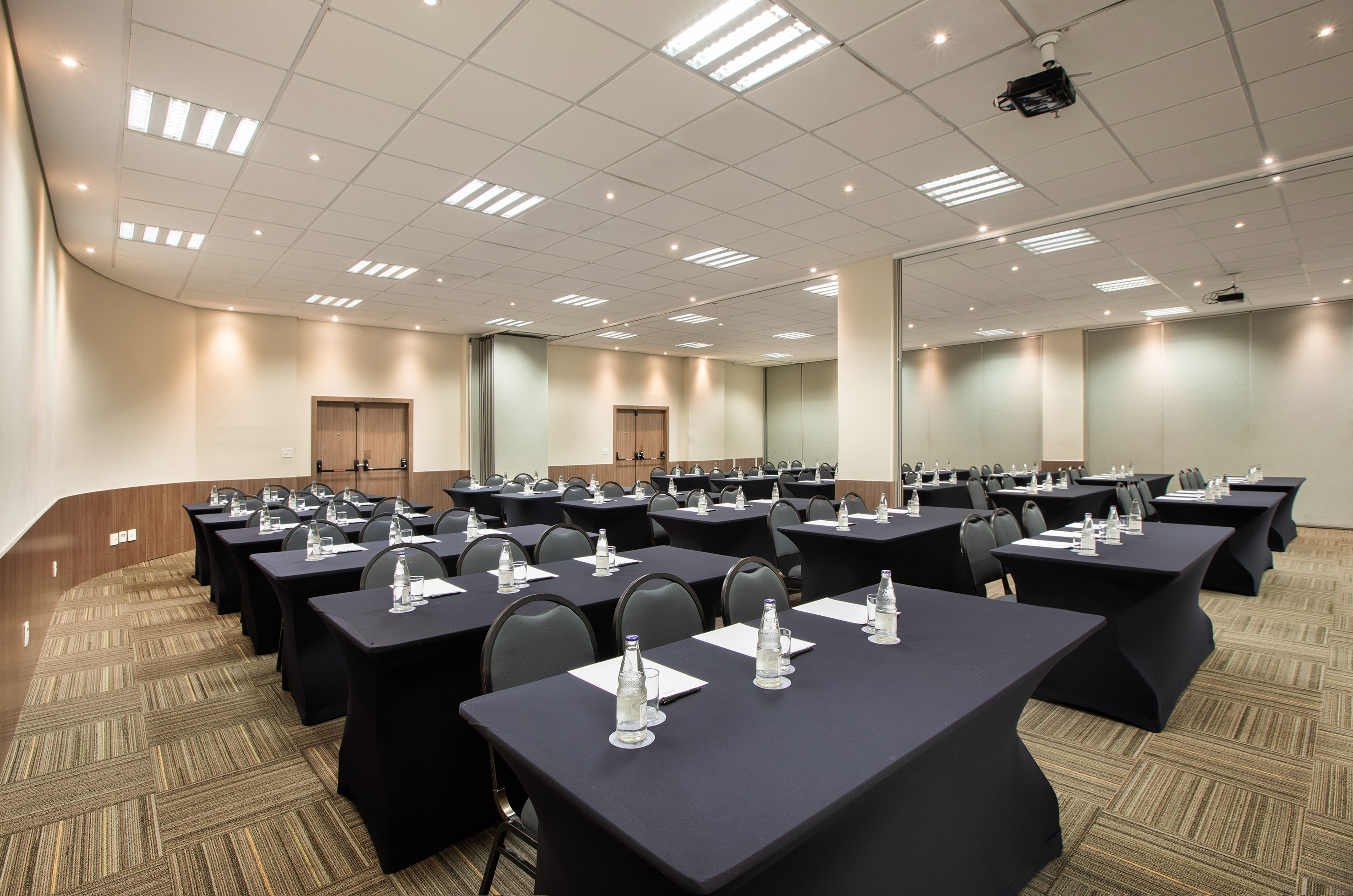 a room with tables and chairs