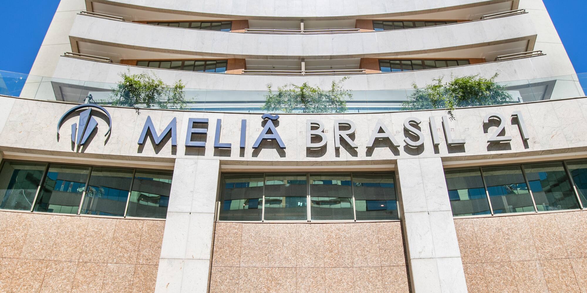 a tall building with a large glass door
