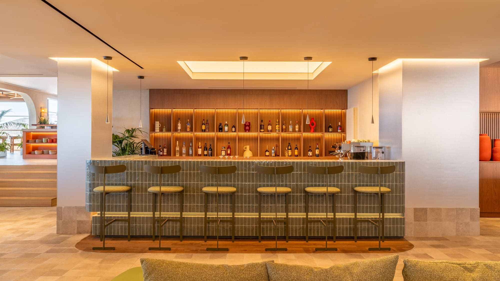 a bar with shelves and bottles of liquor